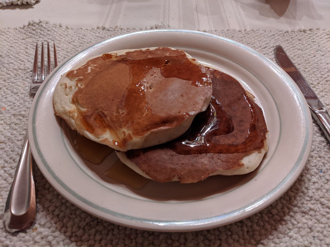 Vegan Pancakes, served with maple syrup. 